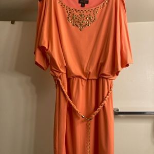 Beautiful orange mini dress, worn once. Size M, open short sleeve.